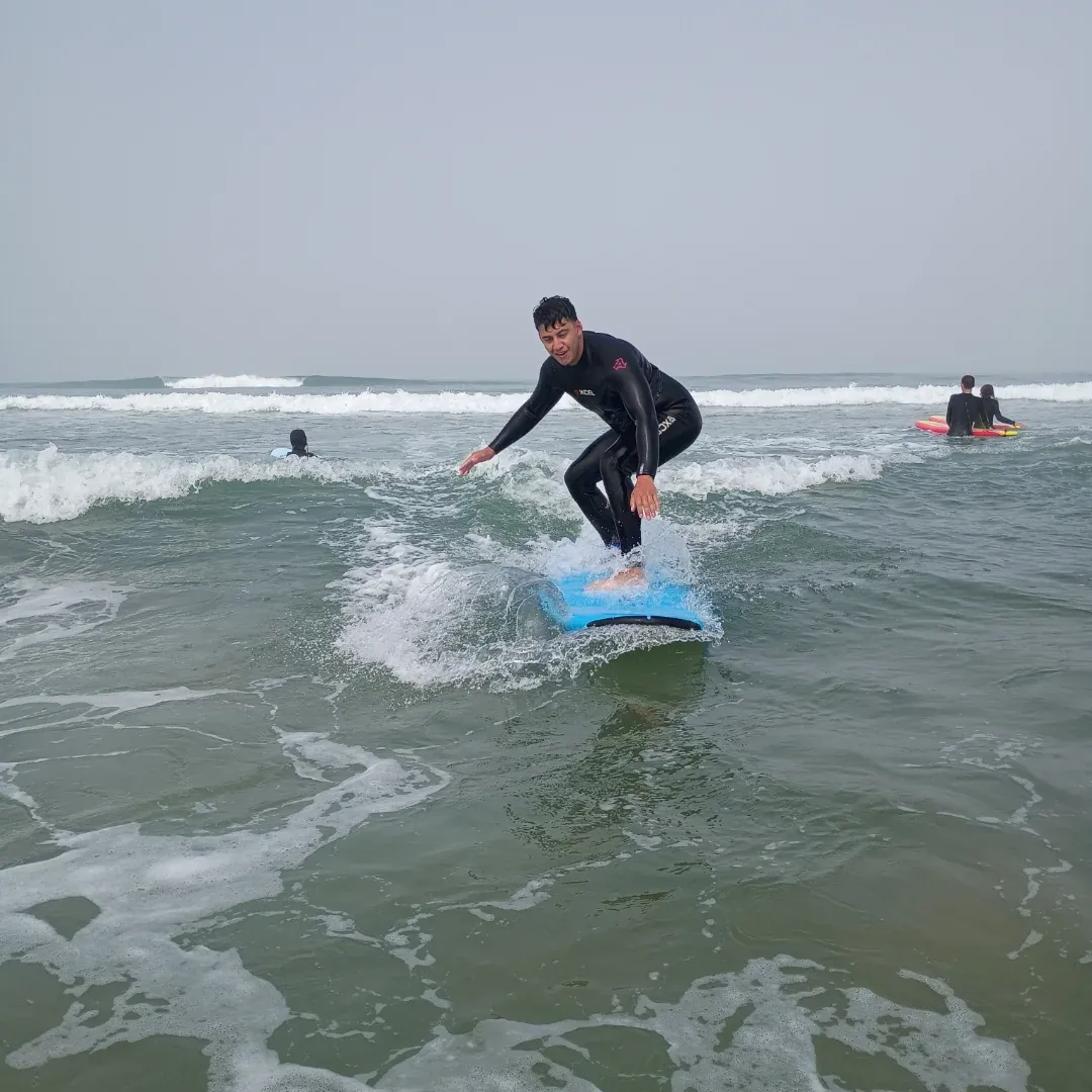 Pismo Surf School instructor teaching a surf lesson