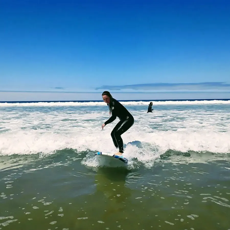 Surfer riding a wave on the Central Coast